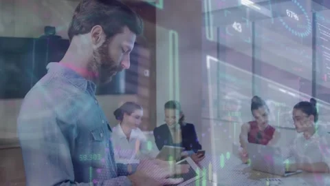 Animation of data processing over diverse business people using computer Stock Footage 328709437