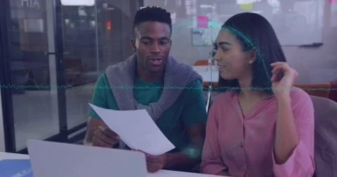 Animation of data processing over diverse man and woman discussing over a Stock Footage 329033242