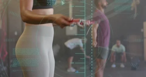 Animation of data processing over diverse woman and man jumping rope cross Stock Footage 329614847