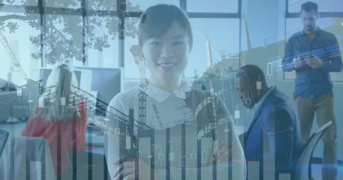 Animation of data processing over diverse business people using laptop Stock Footage 330399574