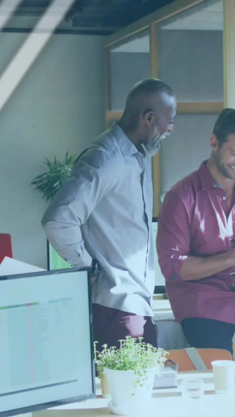Animation of data processing over diverse business people in office Stock Footage 342009819
