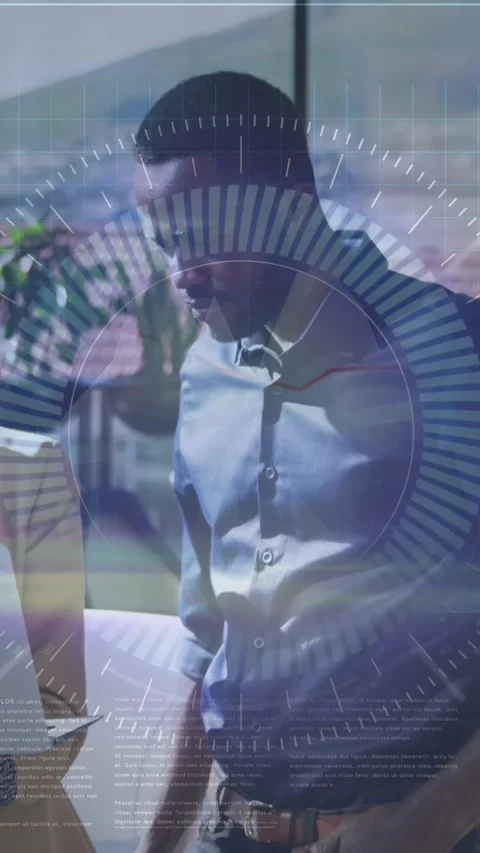 Animation of data processing over diverse man and woman discussing over a laptop Stock Footage 344594761