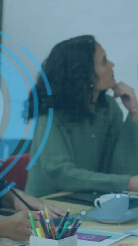 Animation of data processing over diverse business people working in office Stock Footage 344693272