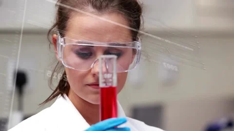 Animation of data processing over female scientists with laboratory test tube Stock Footage 229660612