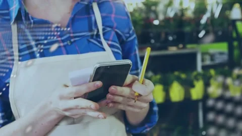 Animation of data processing over hands of caucasian female seller using payment Stock Footage 316462200