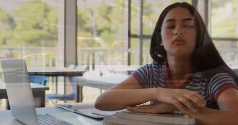 Animation of data processing over schoolgirl sleeping by laptop in class Stock Footage 329922894