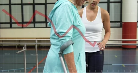 Animation of data processing over senior caucasian woman with coach exercising 動画素材 328934479