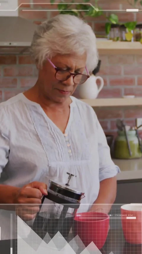 Animation of data processing over senior african american woman preparing coffee Stock Footage 342996814