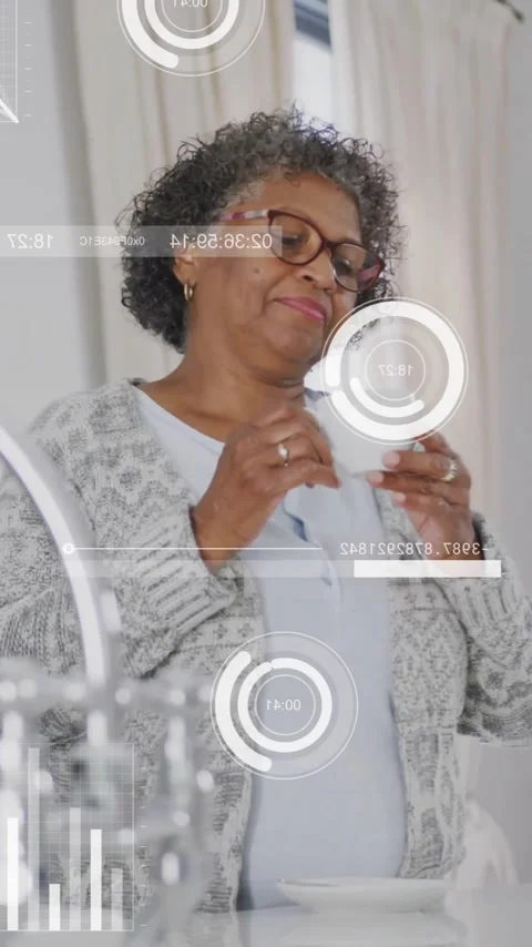 Animation of data processing over senior african american woman drinking coffee Stock Footage 342996820