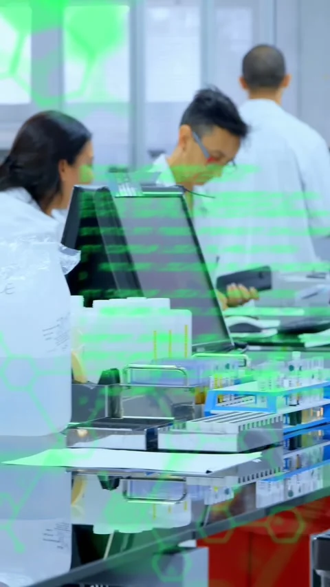 Animation of data processing over senior female scientist using computer at Stock Footage 344783545