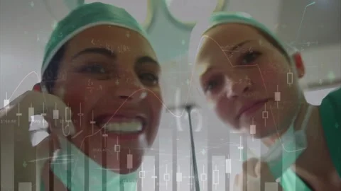 Animation of data processing over smiling caucasian female surgeons removing Video stock 244795453