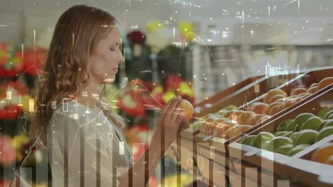 Animation of data processing over smiling caucasian woman smelling fruit in shop Stock Footage 329710203