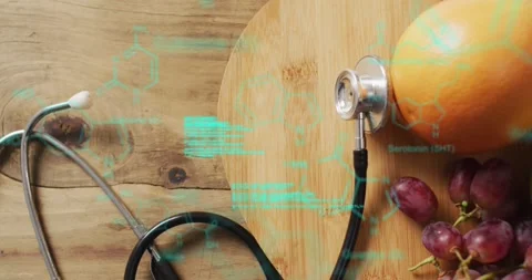 Animation of data processing over stethoscope and fruit Stock Footage 241402485
