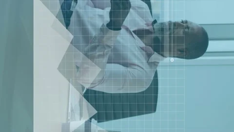 Animation of data processing over thoughtful african american man reading a Stock Footage 312696765