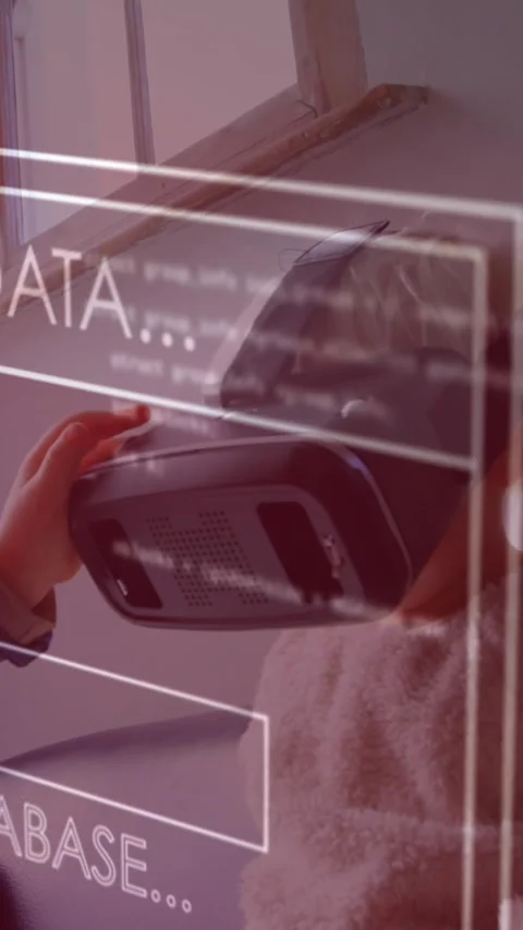 Animation of data processing on screen over child playing with vr headset Stock Footage 341952929
