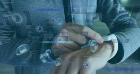 Animation of data processing on screens over caucasian businessman checking Stock Footage 326426138