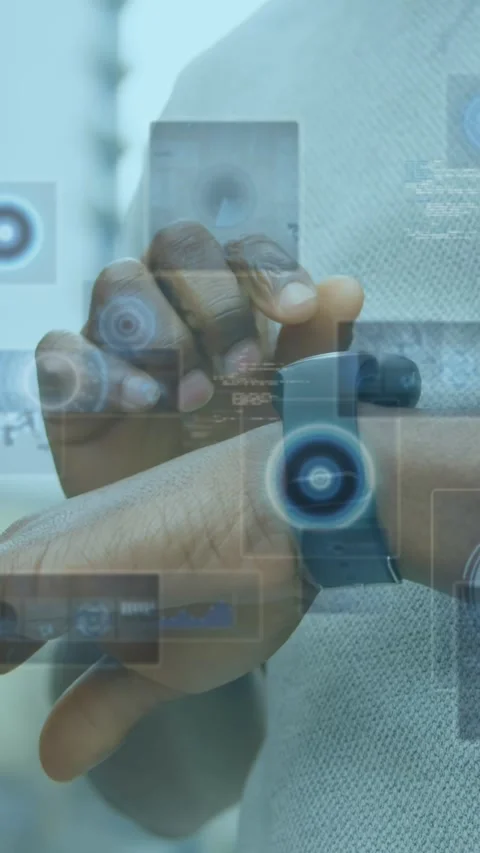 Animation of data processing on screens over man checking smartwatch Stock Footage 341991322