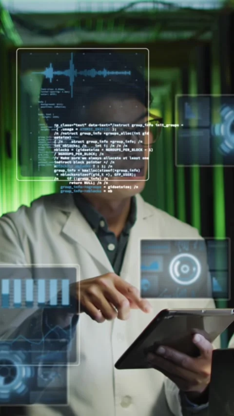 Animation of data processing on screens over diverse man and woman working in Stock Footage 342676088