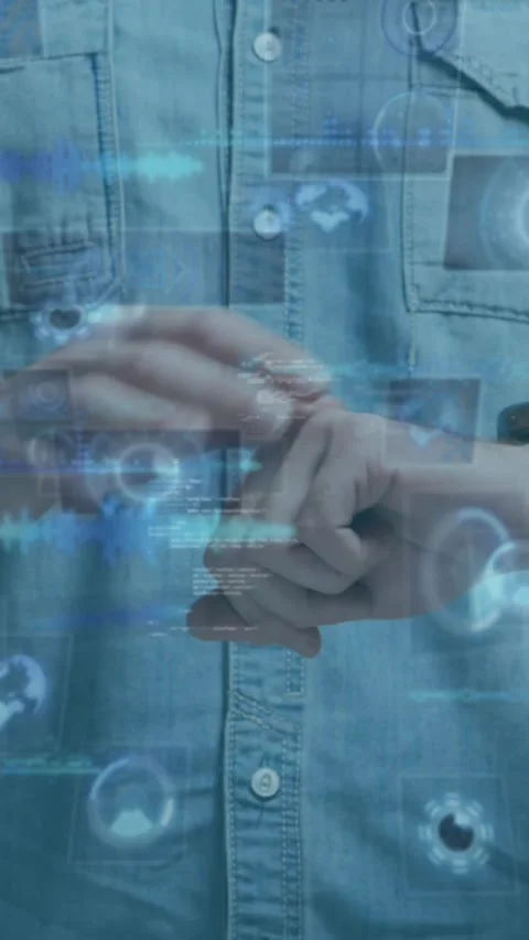 Animation of data processing on screens over caucasian man checking smartwatch Stock Footage 342914974
