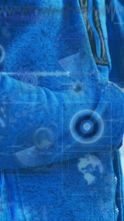 Animation of data processing on screens over caucasian man checking smartwatch Stock Footage 342953537