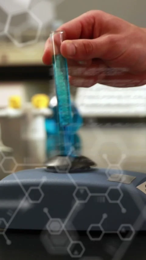 Animation of database and hexagon over cropped hand of caucasian scientist Stock Footage 343682573