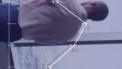 Animation of diagram with data over african american businessman thinking in 库存影片 312411833