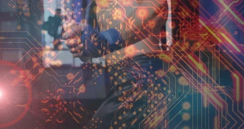 Animation of digital circuit pattern with person using smartphone in modern Stock Footage 305288410