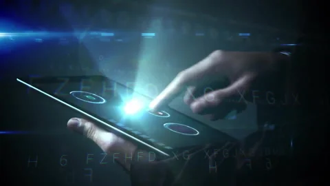 Animation of digital data processing over hands using tablet 動画素材 307985342