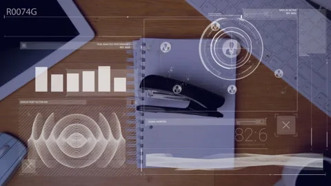 Animation of digital data processing over tablet and computer on desk 動画素材 308769661