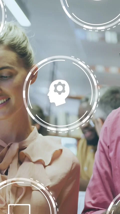Animation of digital icons over diverse business people in office Stock Footage 344369556