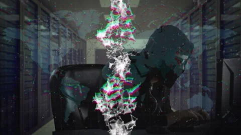 Animation of digital rotating dna helix against man in hood hacking computer at Stock Footage 201994105