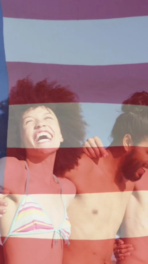 Animation of diverse friends at beach over flag of usa Stock Footage 344774863