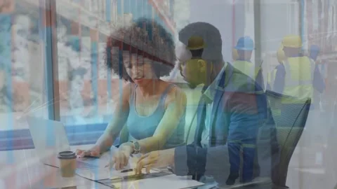 Animation of diverse warehouse workers over two african american business people Stock Footage 328834294