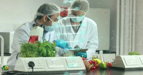 Animation of dna and scientific data processing over diverse scientists in Stock Footage 329923007