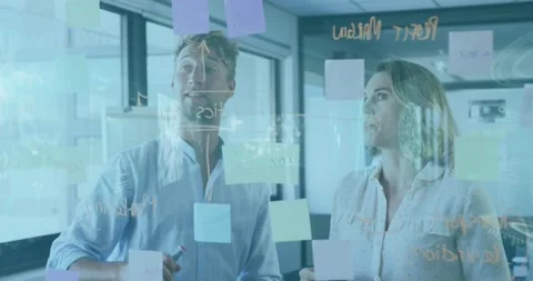 Animation of dna helix, digital brain and data over caucasian coworkers Stock Footage 204820242