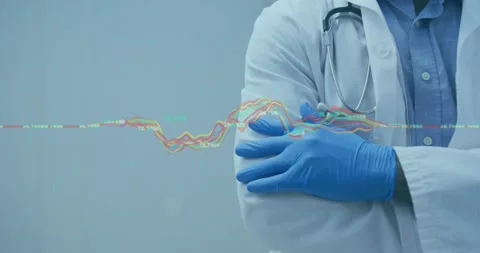 Animation of dna strand spinning over male doctor holding stethoscope Stock Footage 329923494