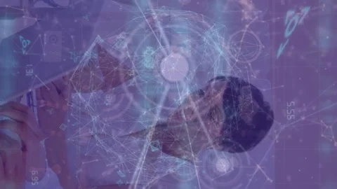 Animation of dots and programming language over caucasian coworkers working over Stock Footage 312797448