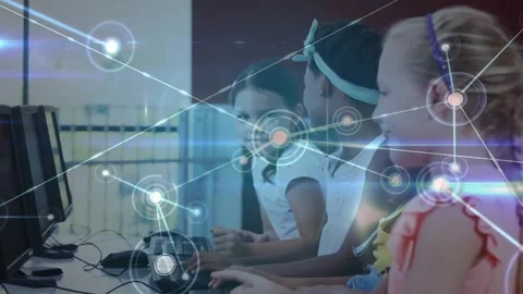 Animation of dots connected with lines over diverse girls using computer in Stock Footage 326304847