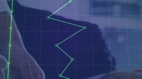 Animation of dots forming graph over grid pattern against diverse coworkers 스톡 동영상 312325204