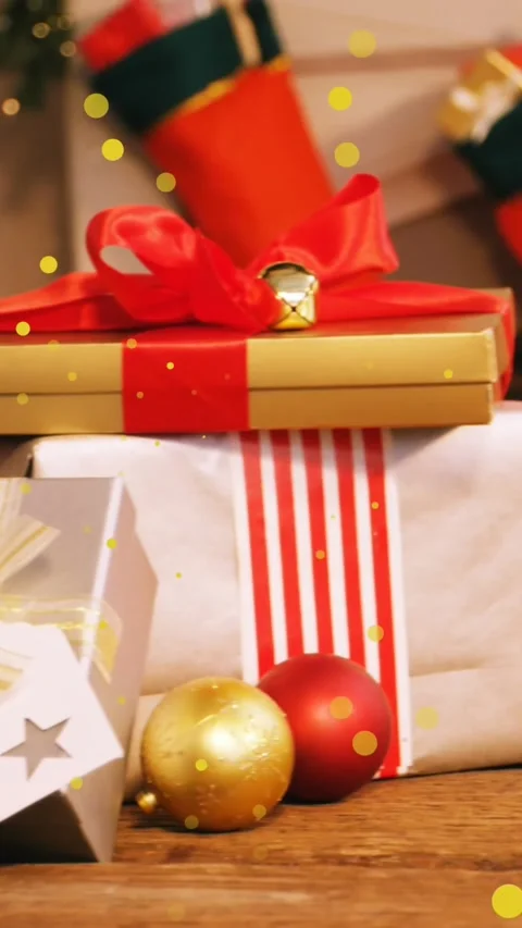 Animation of dots moving over presents and christmas tree Stock Footage 344635791