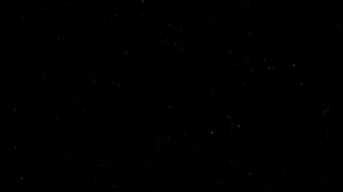 Animation dust particles on a black background 4K Stock Footage 76519926