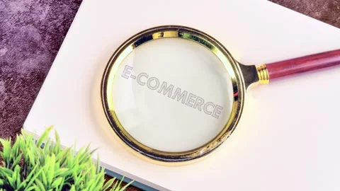 Animation of the E-COMMERCE text. Explore how technology and animation redefine Stock Footage 296805008
