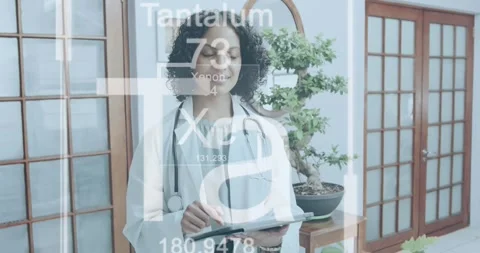 Animation of elements over biracial female doctor Stock Footage 247927492