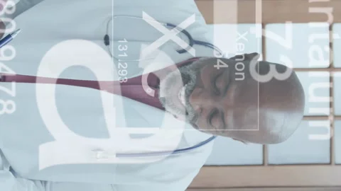 Animation of elements symbols over african american male doctor having video Stock Footage 312544695