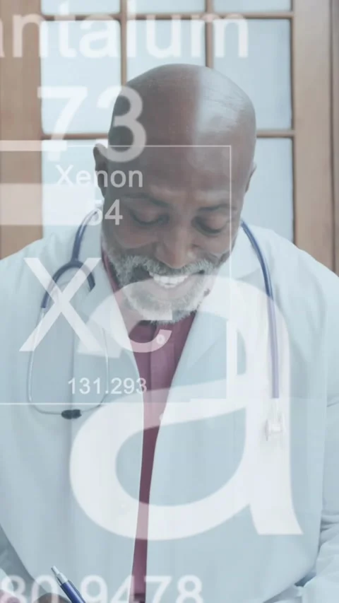 Animation of elements symbols over african american male doctor having video Stock Footage 323783629