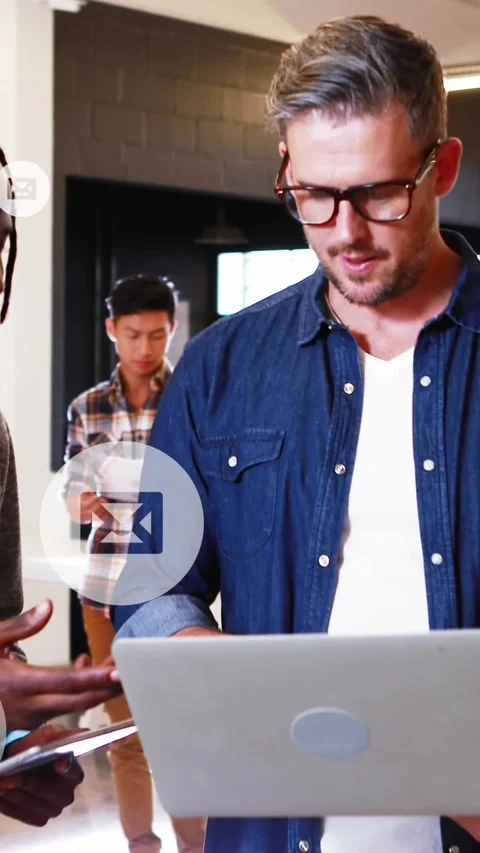 Animation of email icons data processing over diverse business people in office Video stock 320811341