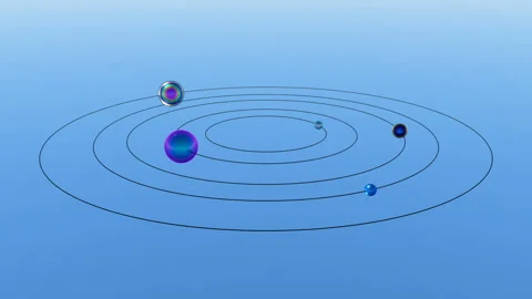 Animation of the endless movement of rainbow metal balls strung in their orbit Stock Footage 127486351