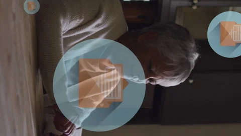 Animation of envelope icons in circles over senior woman scrolling on smartphone Stock Footage 312965554