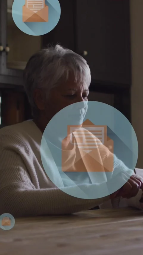 Animation of envelope icons in circles over senior woman scrolling on smartphone Stock Footage 323578618