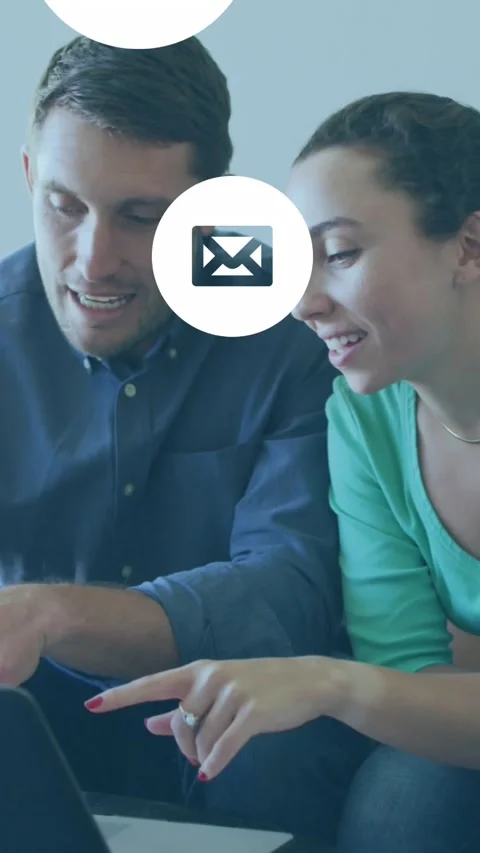 Animation of envelope icons over caucasian couple using laptop Vídeo Stock 343779488